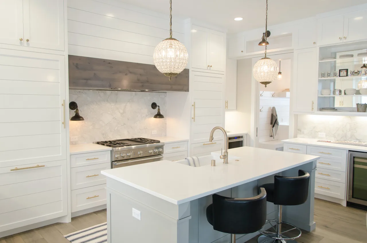 white kitchen with pendant lights, generic stock